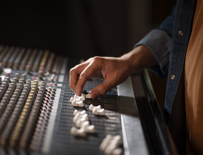 side-view-musician-working-studio